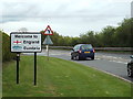 NY3266 : B7076 road entering England by Malc McDonald