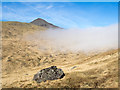 NM5532 : Boulder beside path below Torr na h-Uamha by Trevor Littlewood