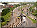 SJ9399 : Metrolink Tram on Lord Sheldon Way by David Dixon