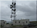 NM0444 : Mast and telephone exchange at Scarinish by M J Richardson