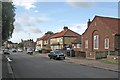 TL4656 : Coleridge Road: telephone exchange and a classic car by John Sutton