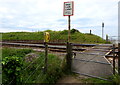 SN3607 : Yellow emergency telephone alongside a level crossing, St Ishmael by Jaggery