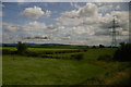 NZ4106 : Fields and pylon line east of Mount Pleasant Farm by Christopher Hilton