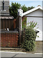 TM1570 : Village Hall sign on Mill Road by Geographer