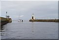 NH8857 : Boat leaving Nairn harbour by Craig Wallace