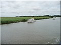 TM4995 : Boats heading upstream on the River Waveney by Christine Johnstone