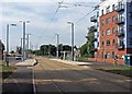 SK5638 : Meadows Embankment tram stop ready to open by John Sutton