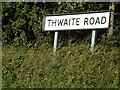 TM0968 : Thwaite Road sign by Geographer