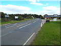 TQ0297 : Road junction and county boundary near Chorleywood by Malc McDonald