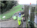 SP9113 : Repairing Startops Reservoir (6) Grouting Stonework at the Reservoir Spillway by Chris Reynolds