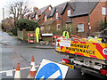 SP9111 : Erecting a new road sign in Miswell Lane, Tring by Chris Reynolds