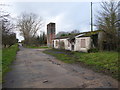 SP4105 : RAF Stanton Harcourt guard room/gatehouse and water tower by Vieve Forward