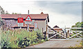 SK6590 : Level-crossing at site of Scrooby station, ECML 1992 by Ben Brooksbank