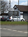 TM1853 : Roadsigns on the B1077 Ashbocking Road by Geographer