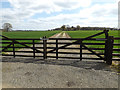 TM1257 : Field entrance off the entrance to Home Farm by Geographer