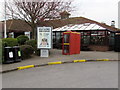 ST3552 : Phoneboxes and litter bins, Sedgemoor Services Northbound by Jaggery