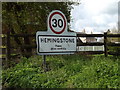 TM1553 : Hemingstone Village Name sign on Main Road by Geographer