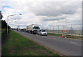 TQ0975 : Traffic queue on Southern Perimeter Road at temporary traffic control by Andrew Tatlow