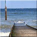 SH7882 : Waves attacking the upper landing stage by Gerald England