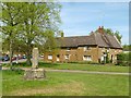 SP8797 : The cross, Lyddington Green by Alan Murray-Rust