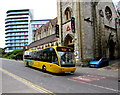 SZ0891 : Yellow bus descends Exeter Road, Bournemouth by Jaggery