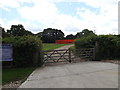 TM0946 : Entrance to Woodlands Farm by Geographer