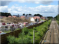 TL9525 : New houses by the railway, Eight Ash Green by Robin Webster