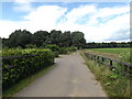 TL9582 : Entrance to Home Farm Cottages by Geographer