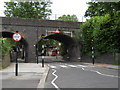 TQ3195 : Railway bridge, Grange Park by Paul Bryan