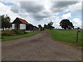 TL9977 : Gipsy Lane Byway to C637 Hopton Road & entrance to Weather Cock Farm by Geographer