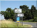 TM0487 : Roadsigns on Banham Road by Geographer