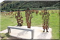 SH7578 : Seat and Statues near Conwy Morfa by Jeff Buck