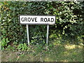 TL9971 : Grove Road sign by Geographer