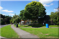 ST7395 : Parish noticeboard and play area in North Nibley by Bill Boaden