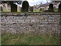 TF0516 : Churchyard wall by Bob Harvey