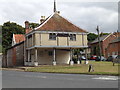 TM0890 : Market Cross, New Buckenham by Geographer