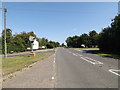 TM1292 : B1113 The Turnpike & Bunwell Village sign by Geographer