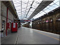 SJ7154 : Crewe railway station: looking south on platform 11 by Jonathan Hutchins