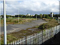 SJ7696 : Trafford: waste ground (former car park) off M60 by Jonathan Hutchins