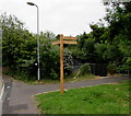 ST2995 : Wooden signpost, Woodside Road, Cwmbran by Jaggery