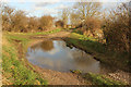 SK8166 : Puddle on Smithy Marsh by Richard Croft