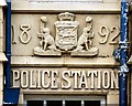 SD8901 : Date stone and coat of arms at Failsworth Police Station by Gerald England