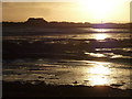 SZ7799 : Low sun, low tide, Snowhill Creek by Rob Farrow