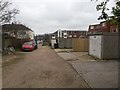 SZ1292 : Boscombe East: footpath J10 passes the garage for number 1072 by Chris Downer