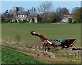 TF5913 : Farm machinery near St Germans Church by Mat Fascione