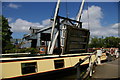 SJ5848 : Narrowboat passes under Wrenbury Bridge by Christopher Hilton