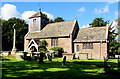 SO6026 : Church and churchyard cross, Brampton Abbotts, Herefordshire by Jaggery