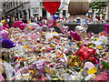 SJ8398 : Floral Tributes at St Ann's Square by David Dixon