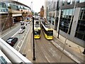 SJ8497 : Passing trams by Gerald England