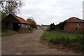 TM3670 : Entrance to North Grange Farm & Footpath by Geographer